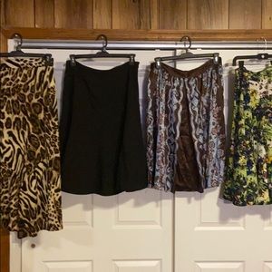 4 Skirts , size 12